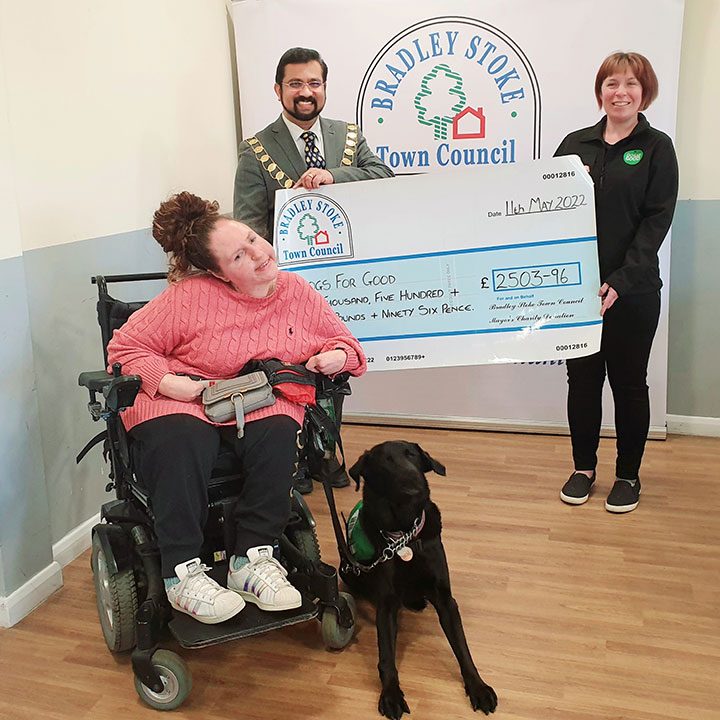Photo of Dogs for Good cheque presentation