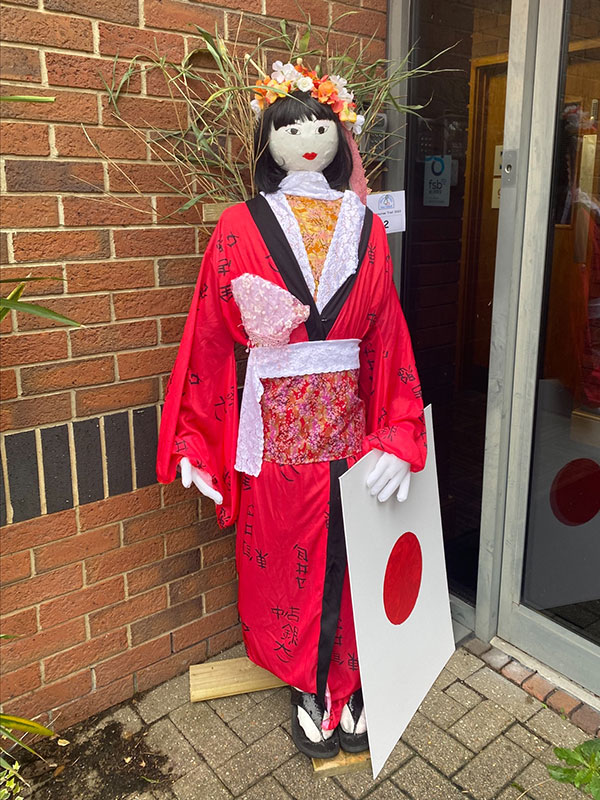 Photo of a scarecrow representing Japan