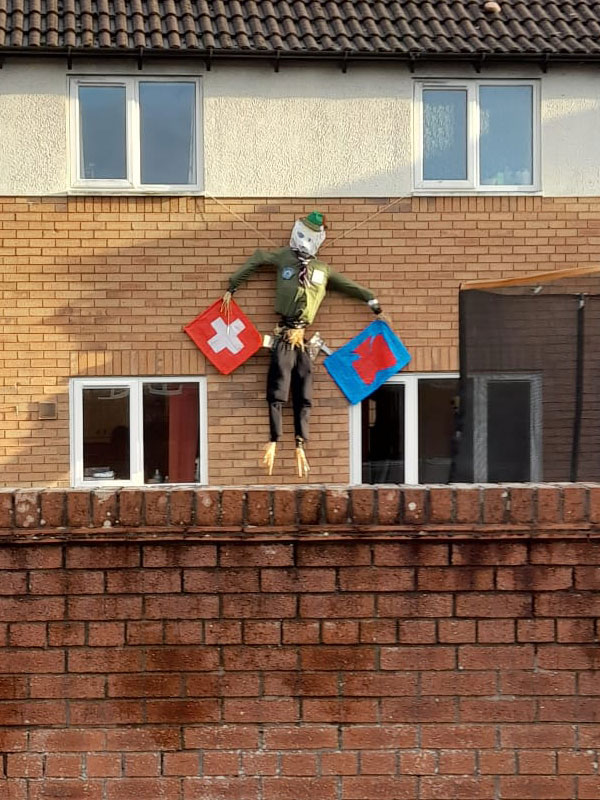Photo of a scarecrow representing Switzerland