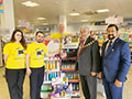 Photo of Councillors Michael Hill and Tom Aditya inaugurating the hygiene bank at Boots Store, Bradley Stoke