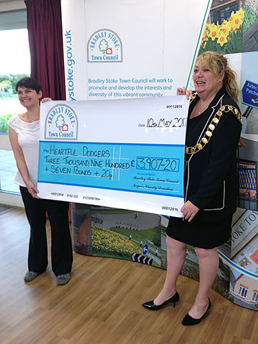 Outgoing Mayor's Charity Cheque presentations