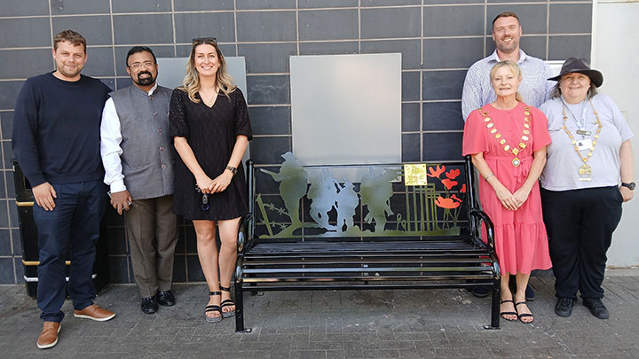 Photo of Mayor, town councillors and staff from the Willow Brook Centre attending the memorial bench unveiling at the Willow Brook Centre on Thursday 10th July 2025