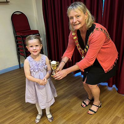 Photo of the Winner of the Mayor's Favourite Award – The Brown Family with their Ladybird